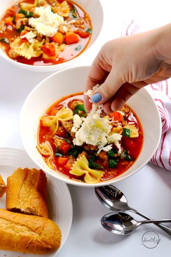 My healthy lasagna soup is a delicious, warm and comforting bowl of cheesy, gooey lasagna heaven. | APinchOfHealthy.com
