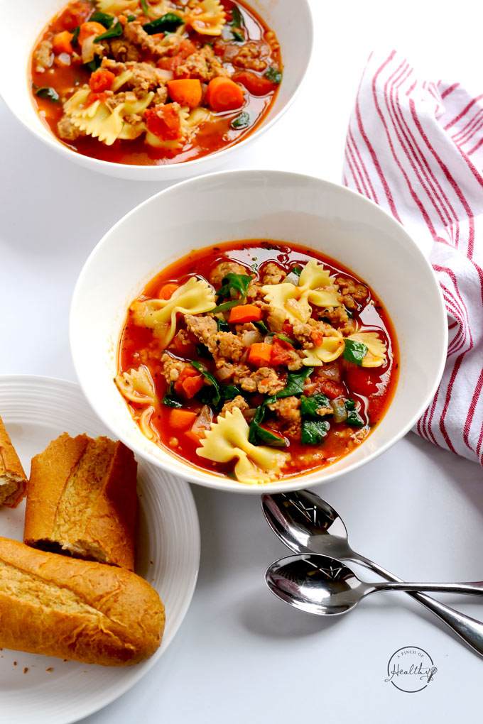 My healthy lasagna soup is a delicious, warm and comforting bowl of cheesy, gooey lasagna heaven. | APinchOfHealthy.com