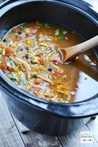 Chicken Tortilla Soup in the Slow Cooker - an easy, delicious meal you can throw together in a snap! | APinchOfHealthy.com