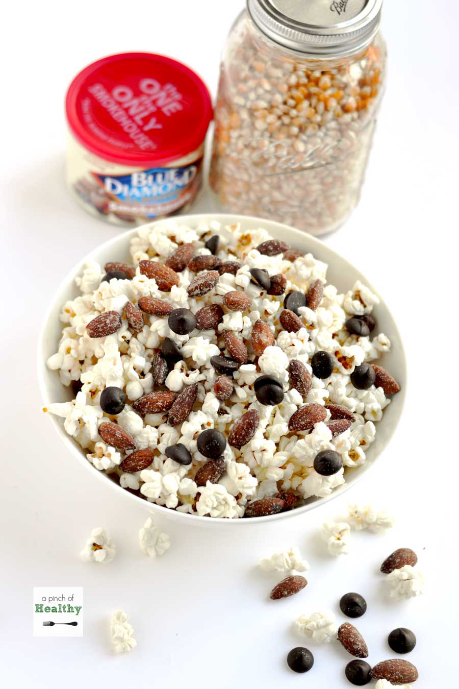 Popcorn with Smokehouse Almonds and Dark chocolate - Perfect game day snacking! | APinchOfHealthy.com