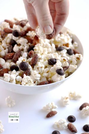 Popcorn with Smokehouse Almonds and Dark chocolate - Perfect game day snacking! | APinchOfHealthy.com