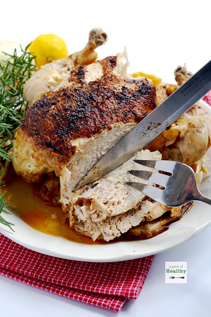 All you need is about 45 minutes to have this amazing tender, juicy Instant Pot whole "rotisserie" chicken. Your whole family will LOVE it! | APinchOfHealthy.com