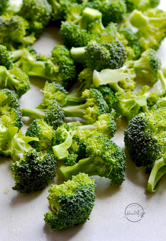 Broccoli cheese soup is creamy, comforting and delicious, and you would never know that this recipe uses no heavy cream. | APinchOfHealthy.com