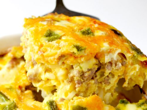 Breakfast casserole with sausage, hash browns, peppers and cheese is perfect for family brunch, and we love making it during the holidays. | APinchOfHealthy.com