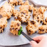 Peanut butter chocolate chip cookie cake with m&ms and buttercream icing - heart shaped for Valentines Day