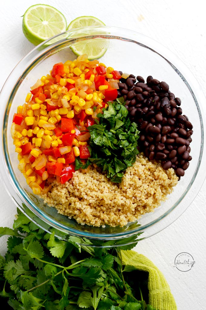Quinoa black bean salad with corn, red pepper, onion, cilantro and lime