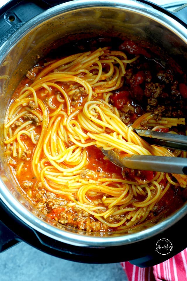 stirring Instant Pot spaghetti