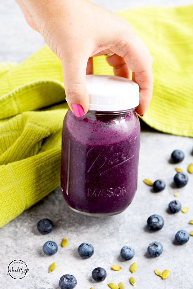 Blueberry smoothie in a mason jar