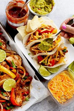 Easy chicken fajitas baked on a sheet pan