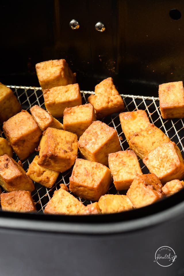 air fryer tofu in fryer basket
