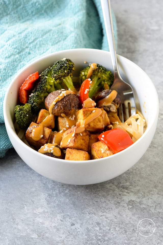 Air Fryer Tofu with veggies, peanut sauce and rice noodles