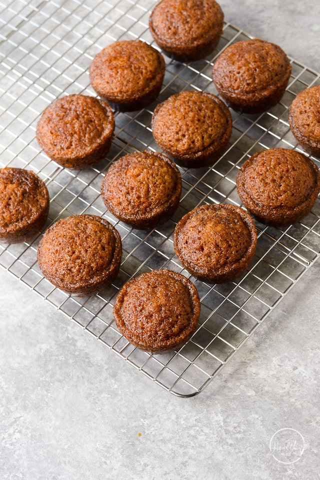 carrot cake cupcakes on wire rack without icing