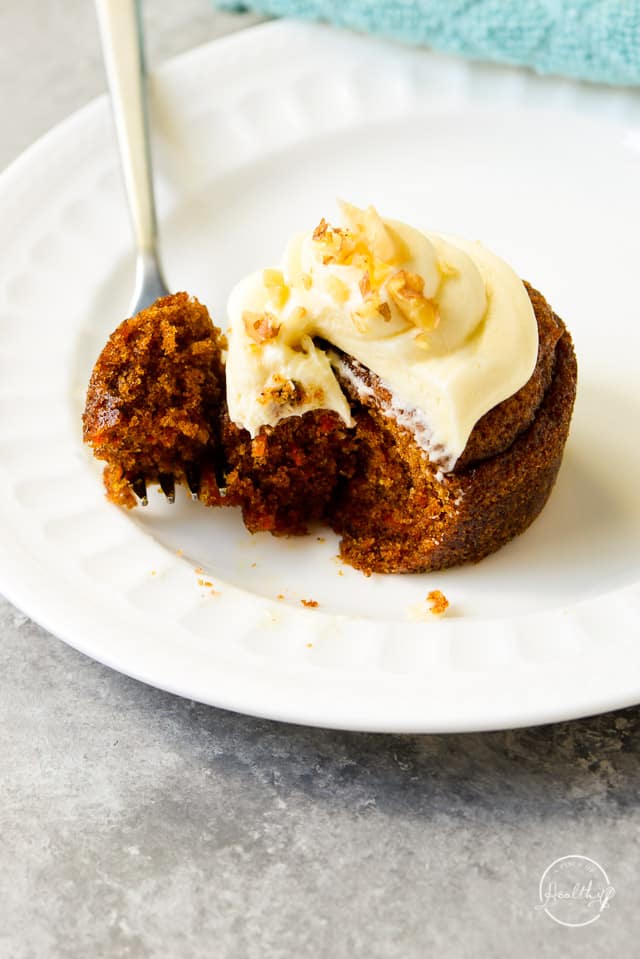 bite cut our of carrot cake cupcake