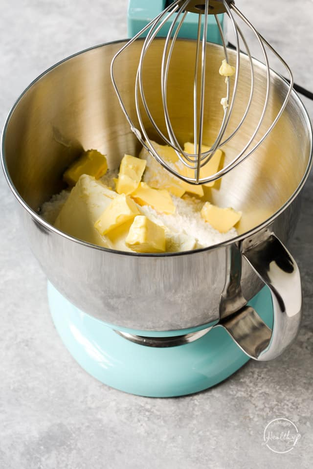 butter, cream cheese and confectioners sugar in a stand mixer