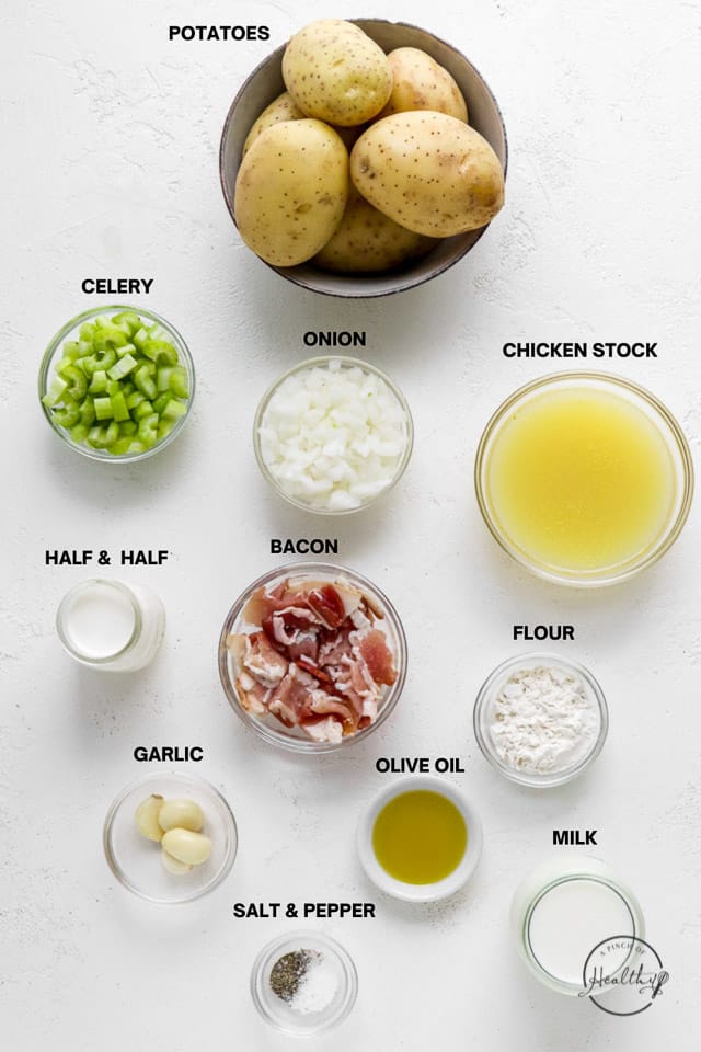 veggies, broth and seasonings labeled on a white surface
