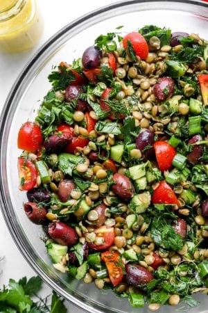 Lentil salad closeup in glass bowl