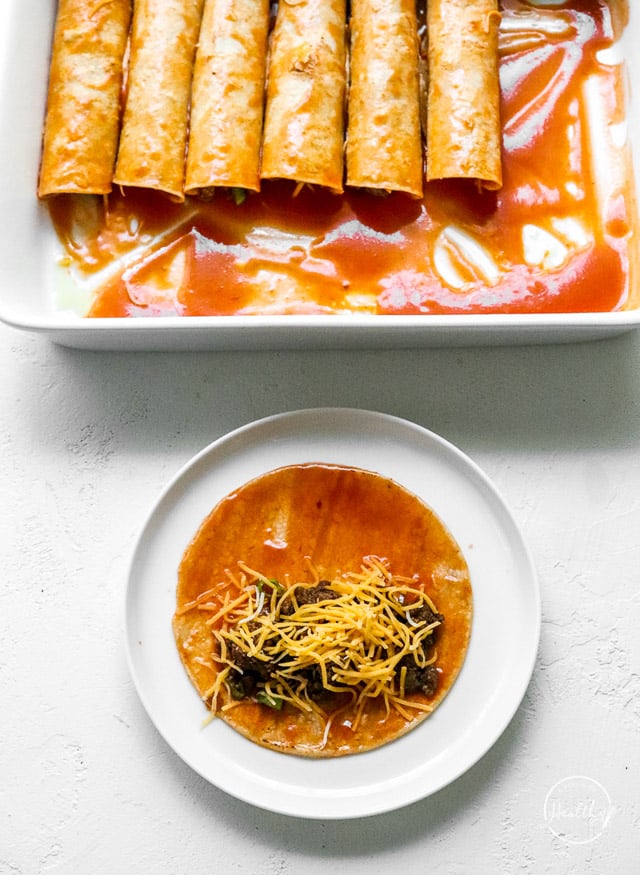 assembling beef enchiladas