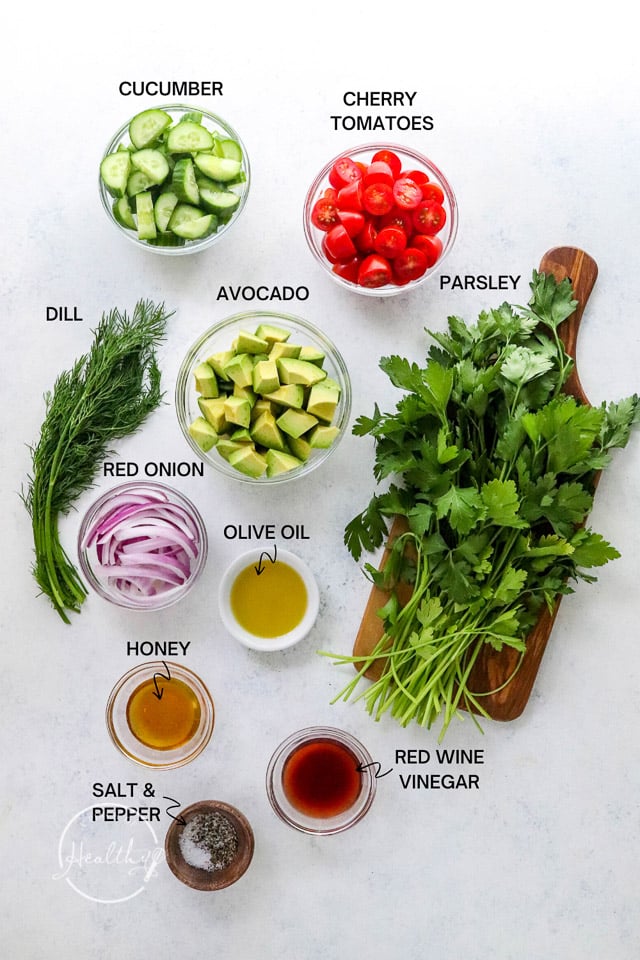 chopped veggies and seasoning ingredients on white surface with label text