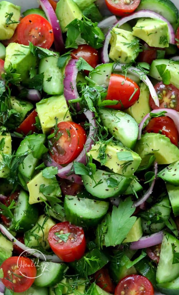 Tomato cucumber avocado salad extreme closeup
