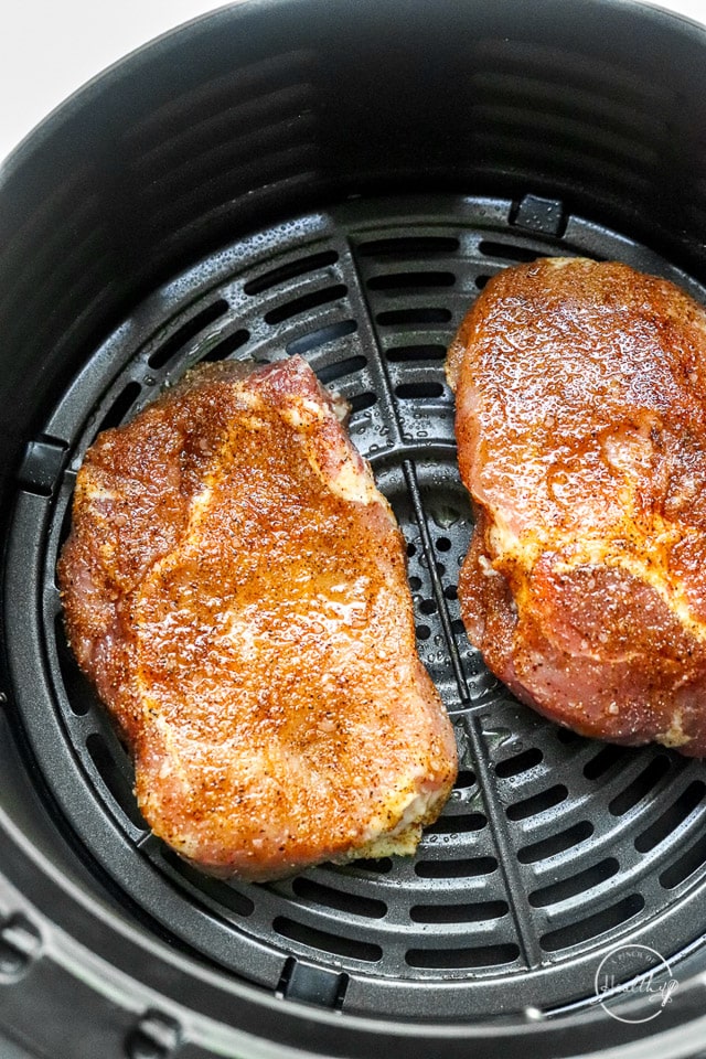 raw pork chops in air fryer basket