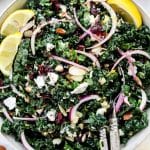 Kale salad in white serving bowl shot closeup