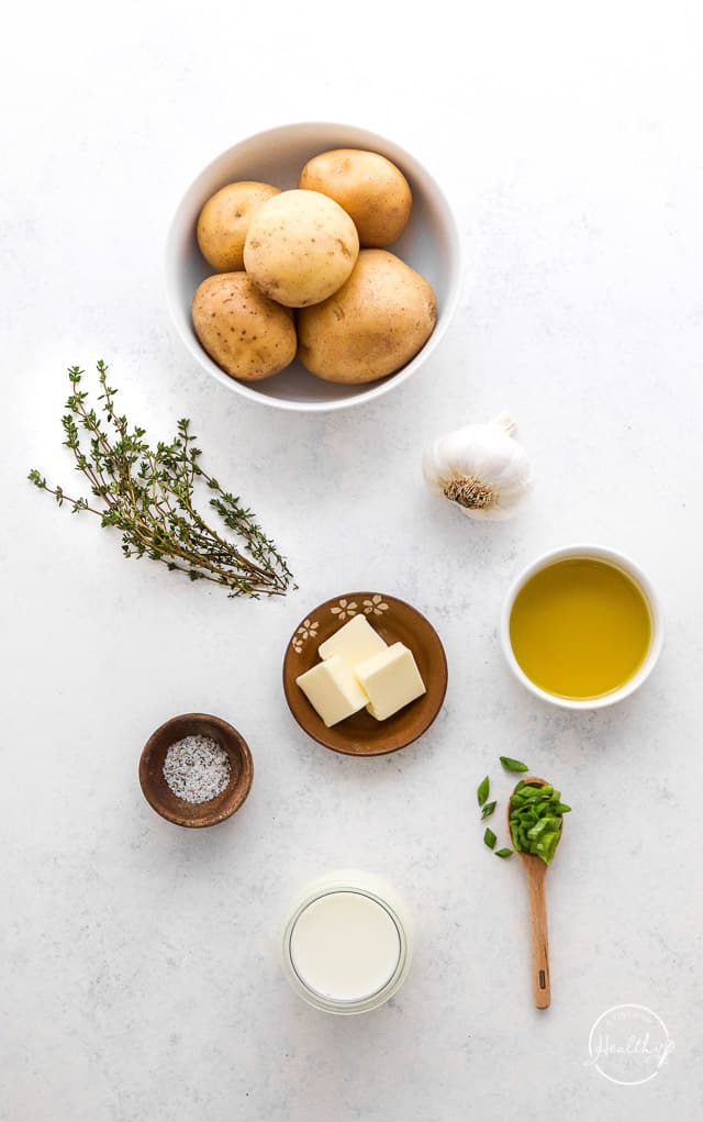 veggies, seasonings and other ingredients on white surface