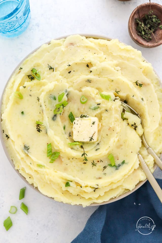 roasted garlic mashed potatoes with butter and herbs