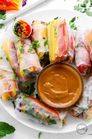 Plate of spring rolls with Thai peanut dipping sauce