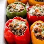 tri color Stuffed Bell Peppers with cheese melted on top