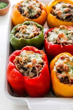 tri color Stuffed Bell Peppers with cheese melted on top
