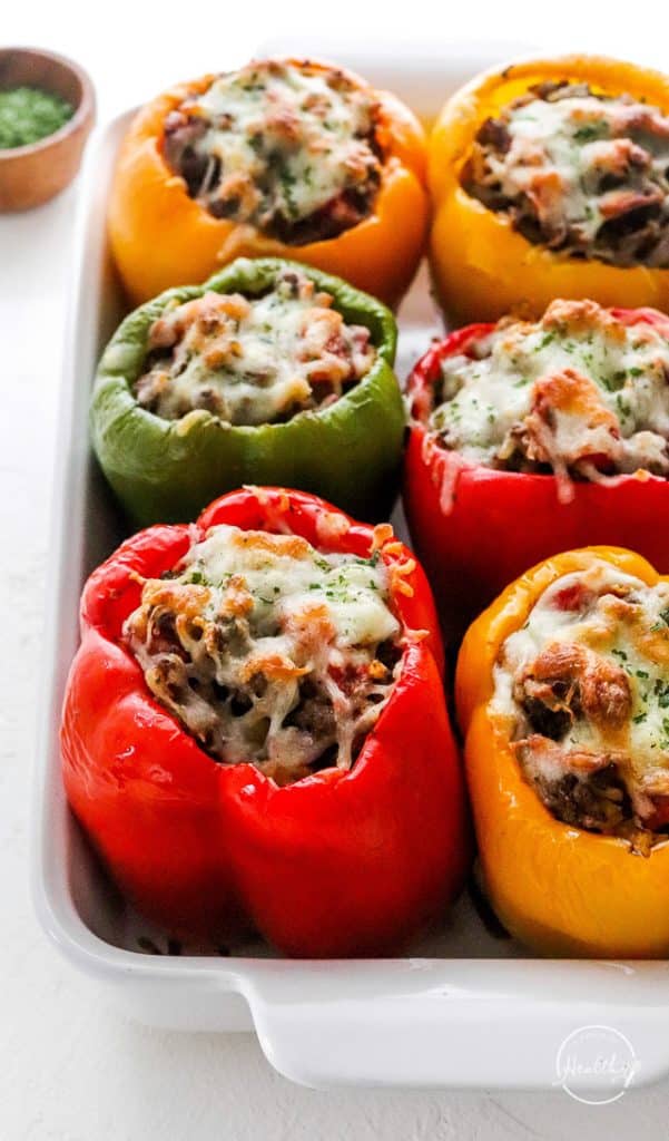 tri color Stuffed Bell Peppers with cheese melted on top