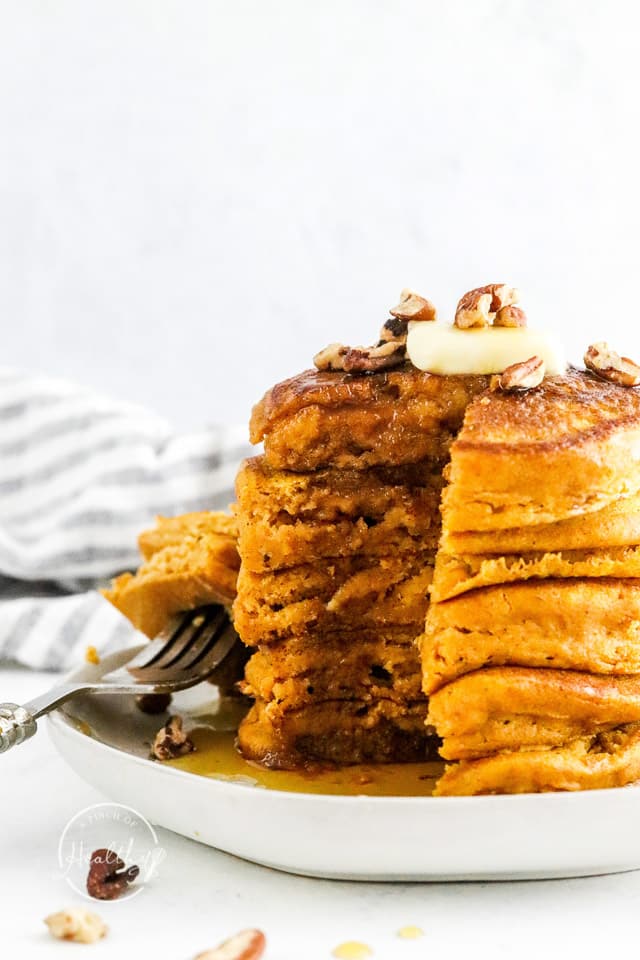 Pumpkin Pancakes side shot, with bites cut out of stack