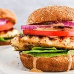 Closeup shot of grilled chicken sandwich with dripping sauce