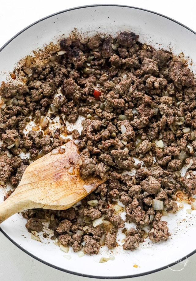 cooking ground beef in a pan