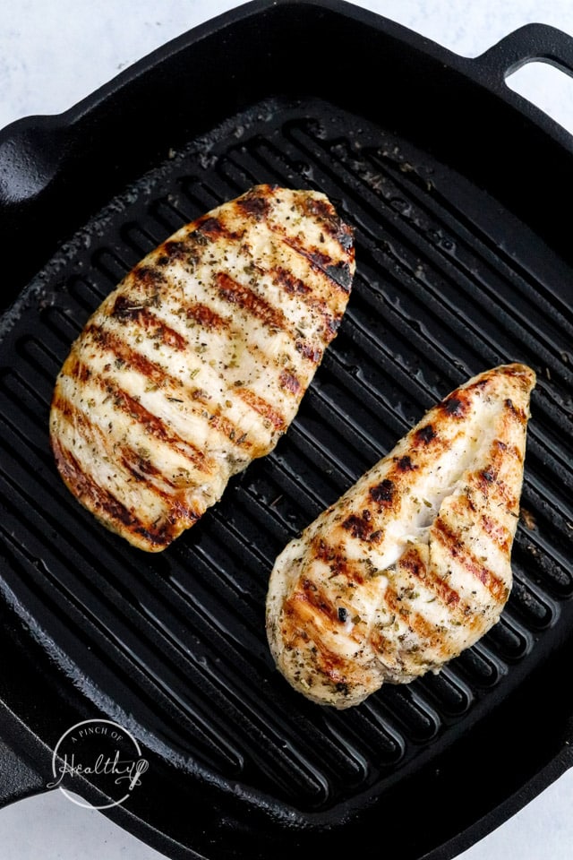 grilling chicken breast on a grill pan