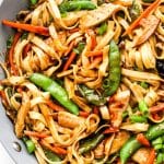 chicken lo mein closeup in pan