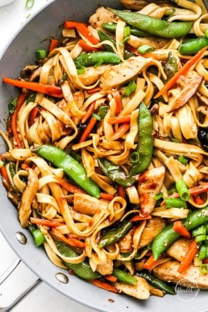chicken lo mein closeup in pan