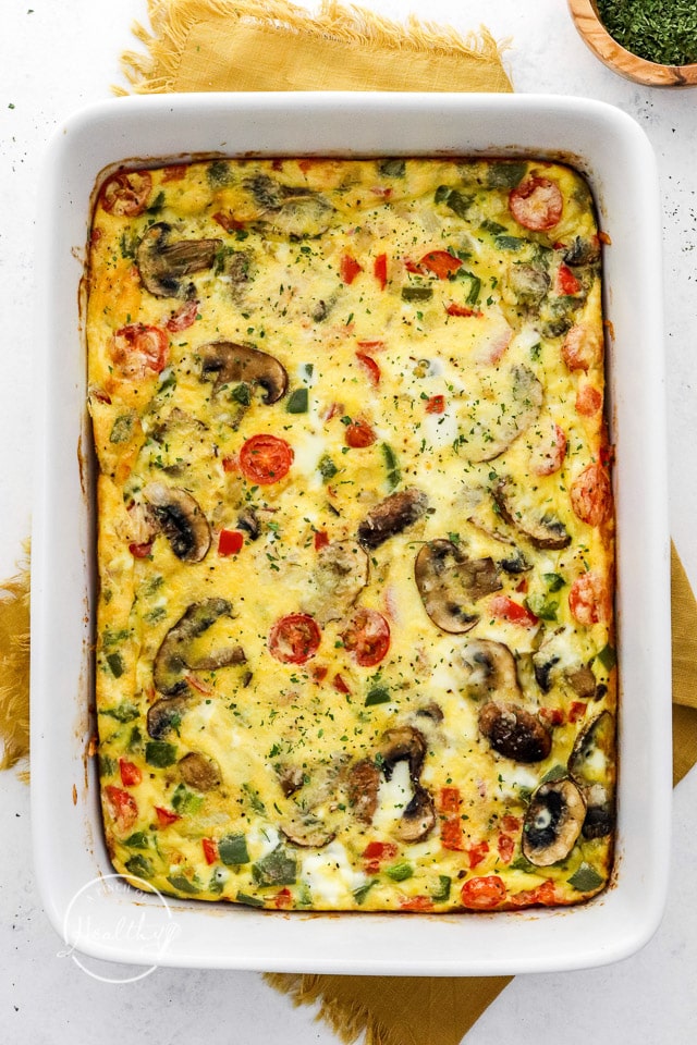 fully cooked veggie breakfast casserole in white dish