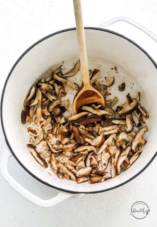 cooking mushrooms in a pot