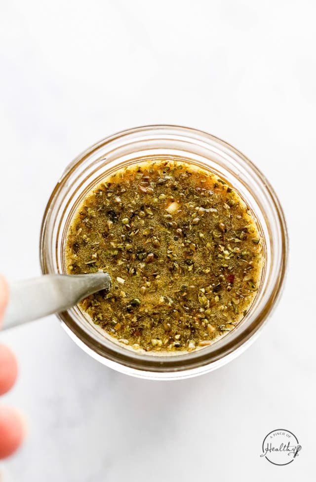 mixing vinaigrette in a jar