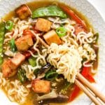 closeup of vegan ramen with chopsticks