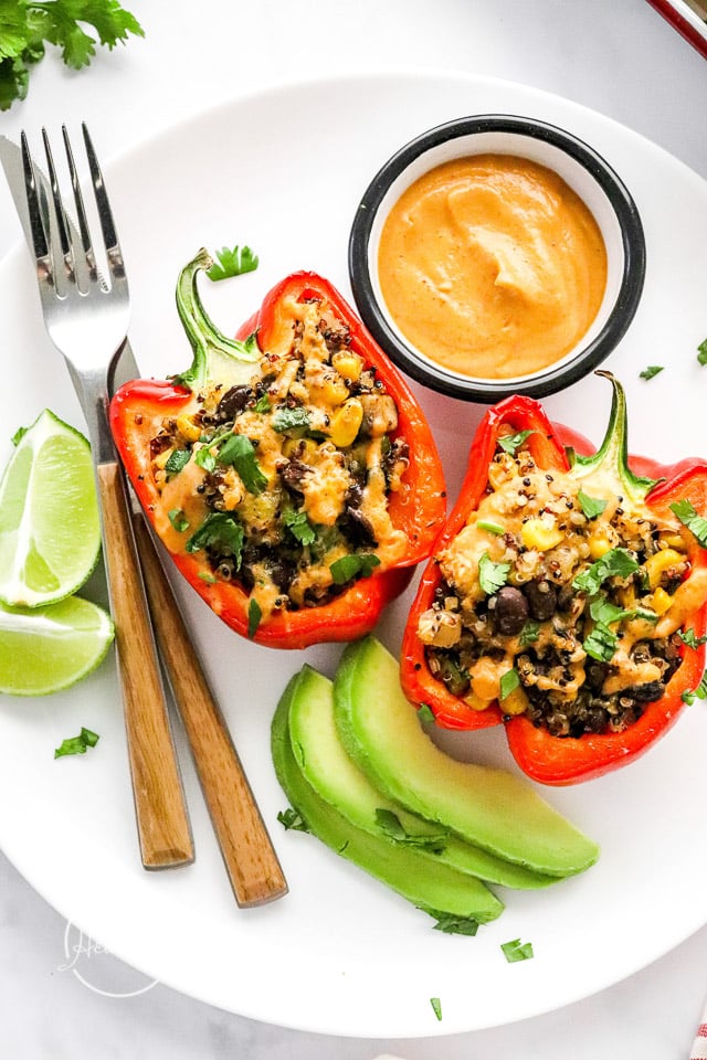 quinoa stuffed peppers on a plate with fork