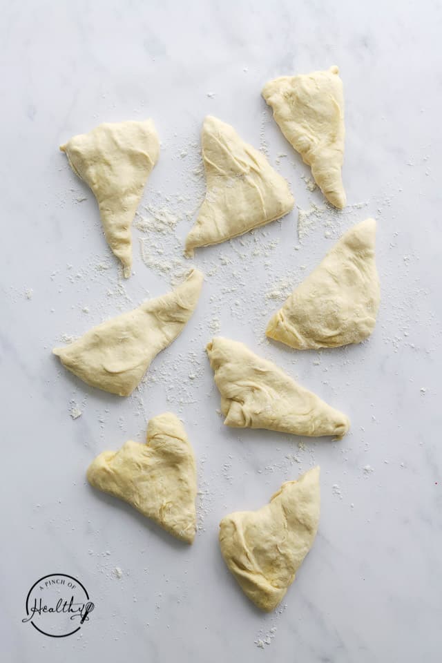 everything bagel dough separated into pieces