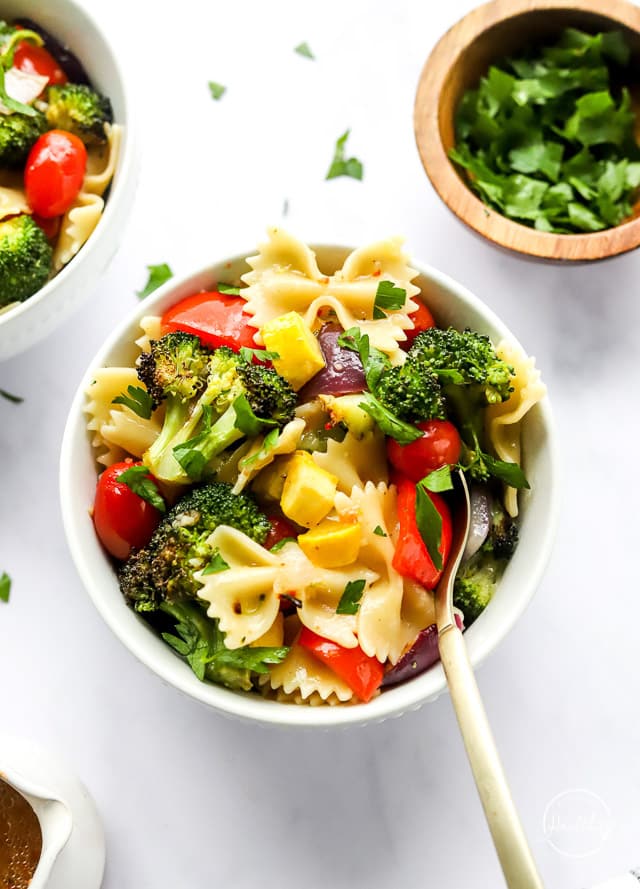 Italian pasta salad in a bowl with fork