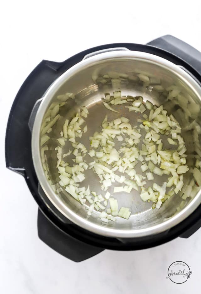 cooking diced onions on sauté in an Instant Pot