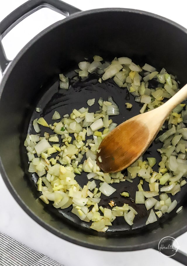 cooking onions in a pot