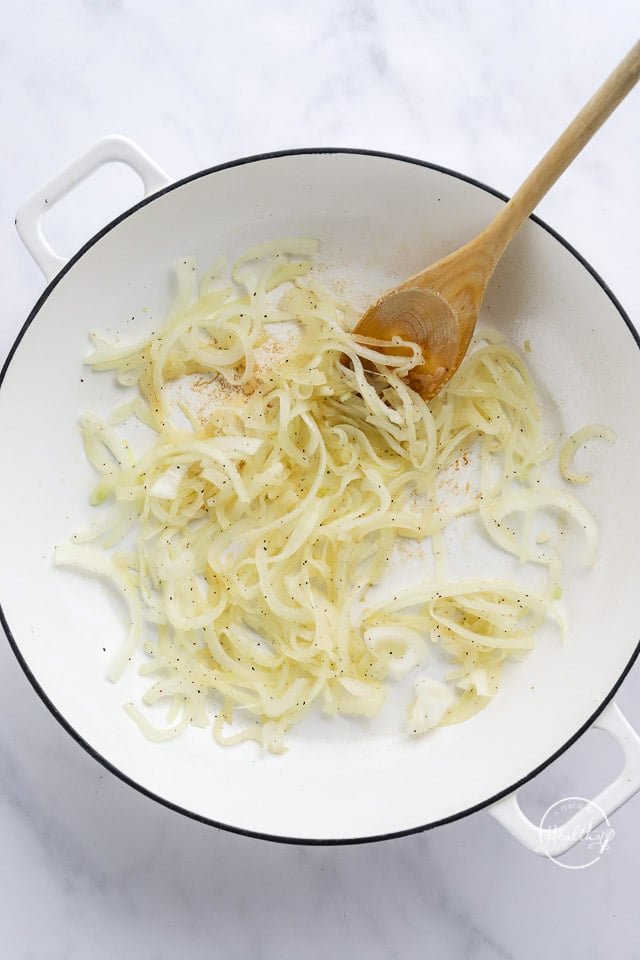 cooking onions in a pot