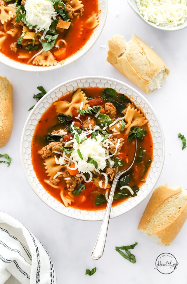 Instant Pot lasagna soup in a white bowl with spoon