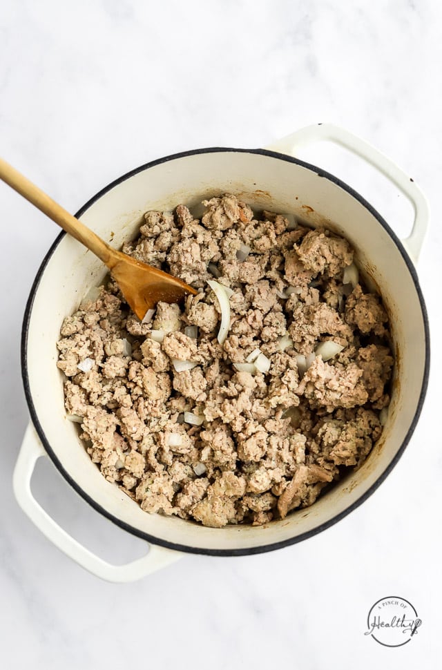 cooking meat in a pot