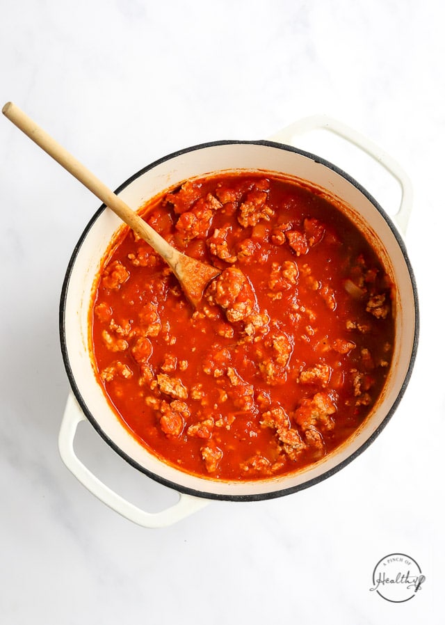 cooking meat sauce in a pot
